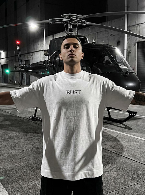 BUST “Business As Usual” T-Shirt — Drop 01
